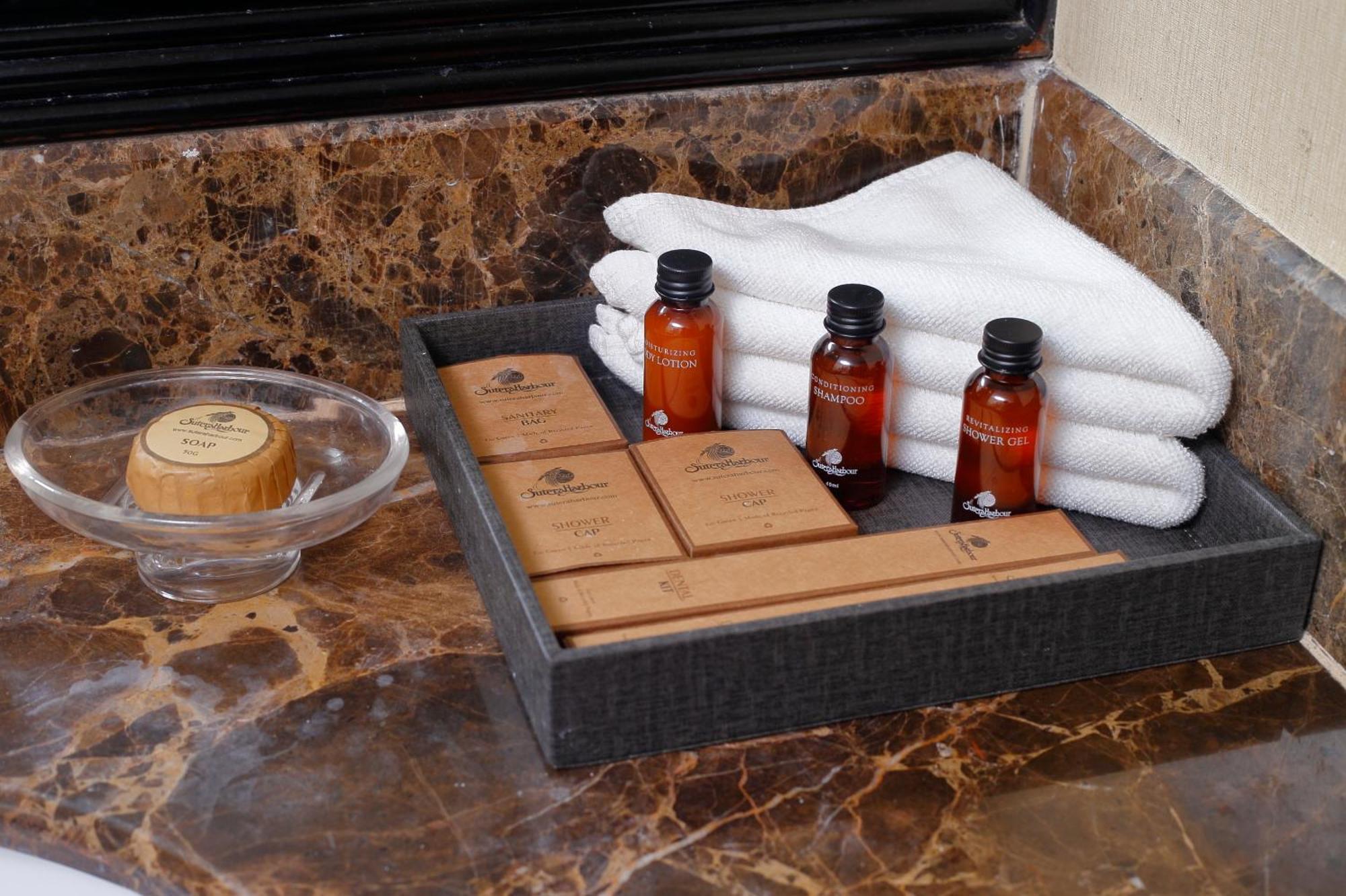 The Pacific Sutera Kota Kinabalu Exterior foto A selection of toiletries in a hotel bathroom